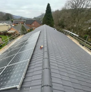 Rooftop with solar panels in residential area.